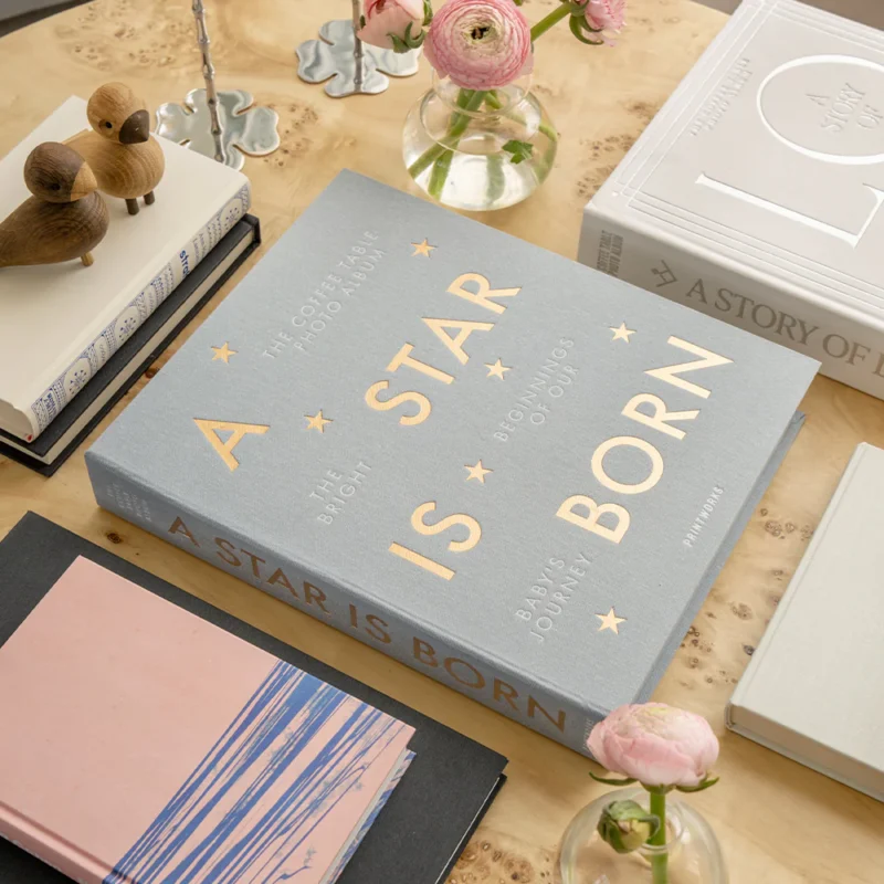 Album Fotografico Bebè – A Star Is Born su tavolo